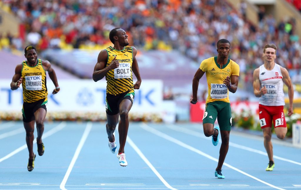 usain bolt corrida sorrindo